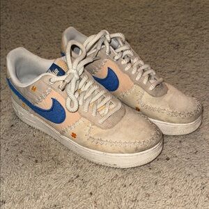 Nike Sneakers with Blue and Beige Accents